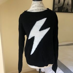 Black sweater with white thunderbolt